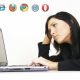 image of lady showing frustration with a do it yourself website builder slouching over a laptop computer georgia web development