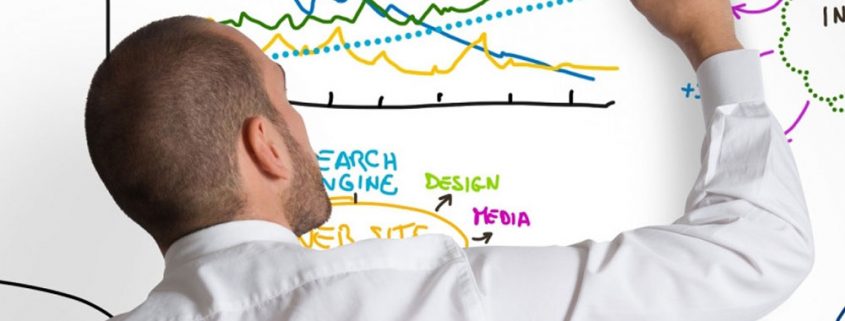 image of seo expert drawing seo strategy on whiteboard georgia web development